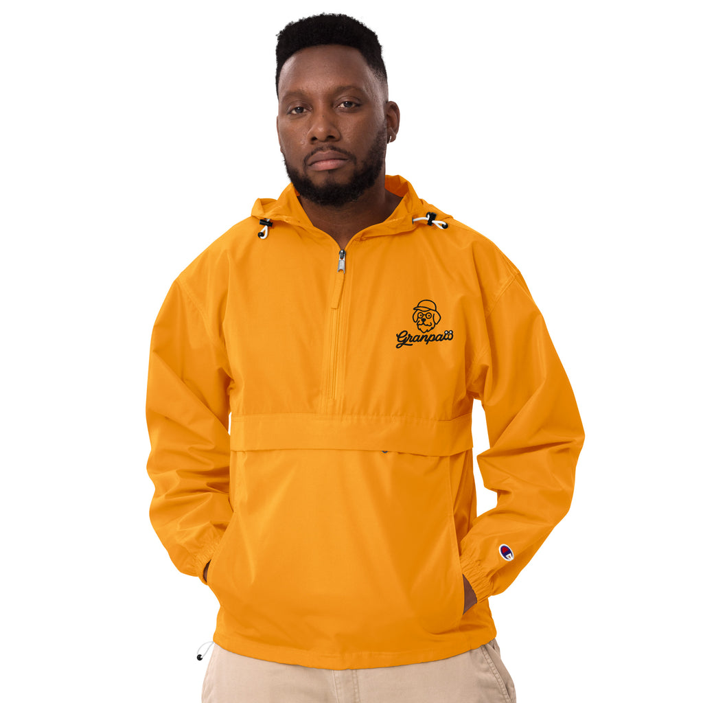 Man wearing a yellow jacket with a logo on a white background