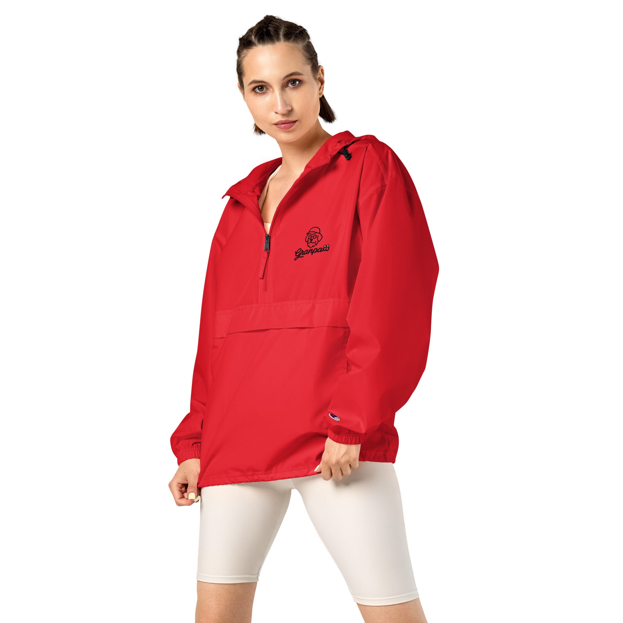 Woman wearing a red jacket with a logo on a white background