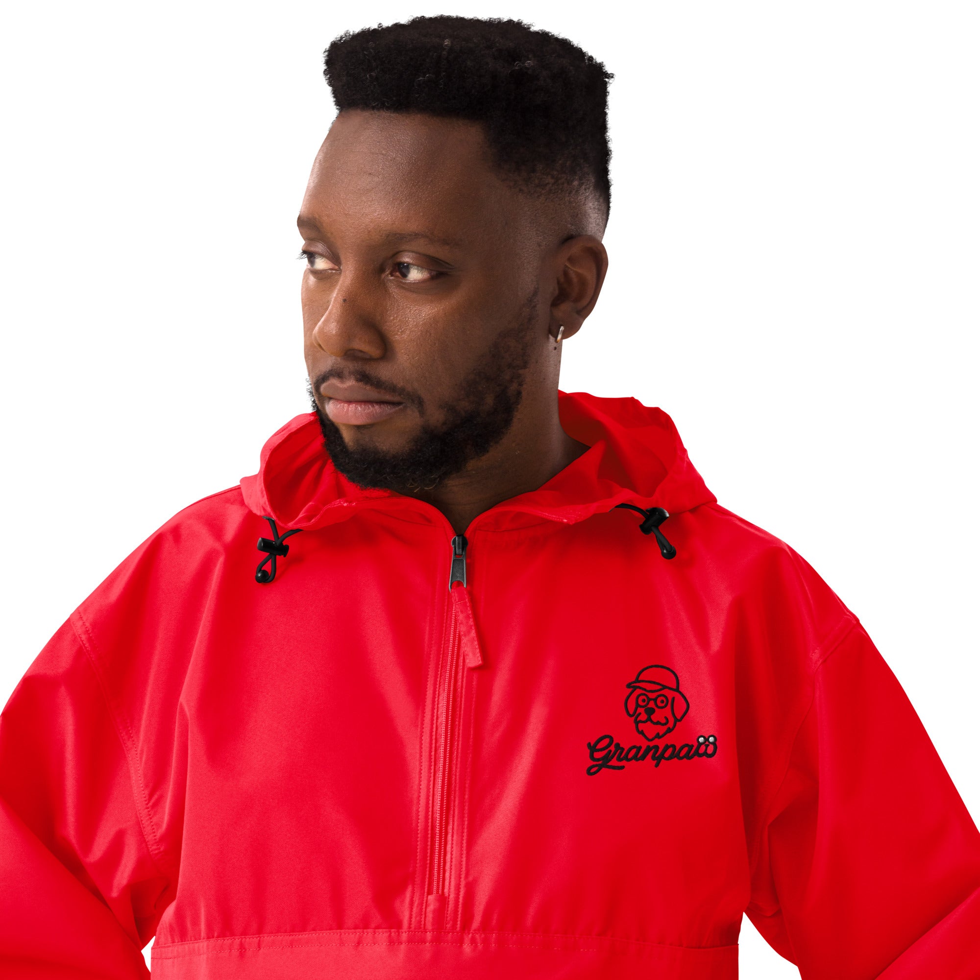 Man wearing a red jacket with a brand logo on a white background