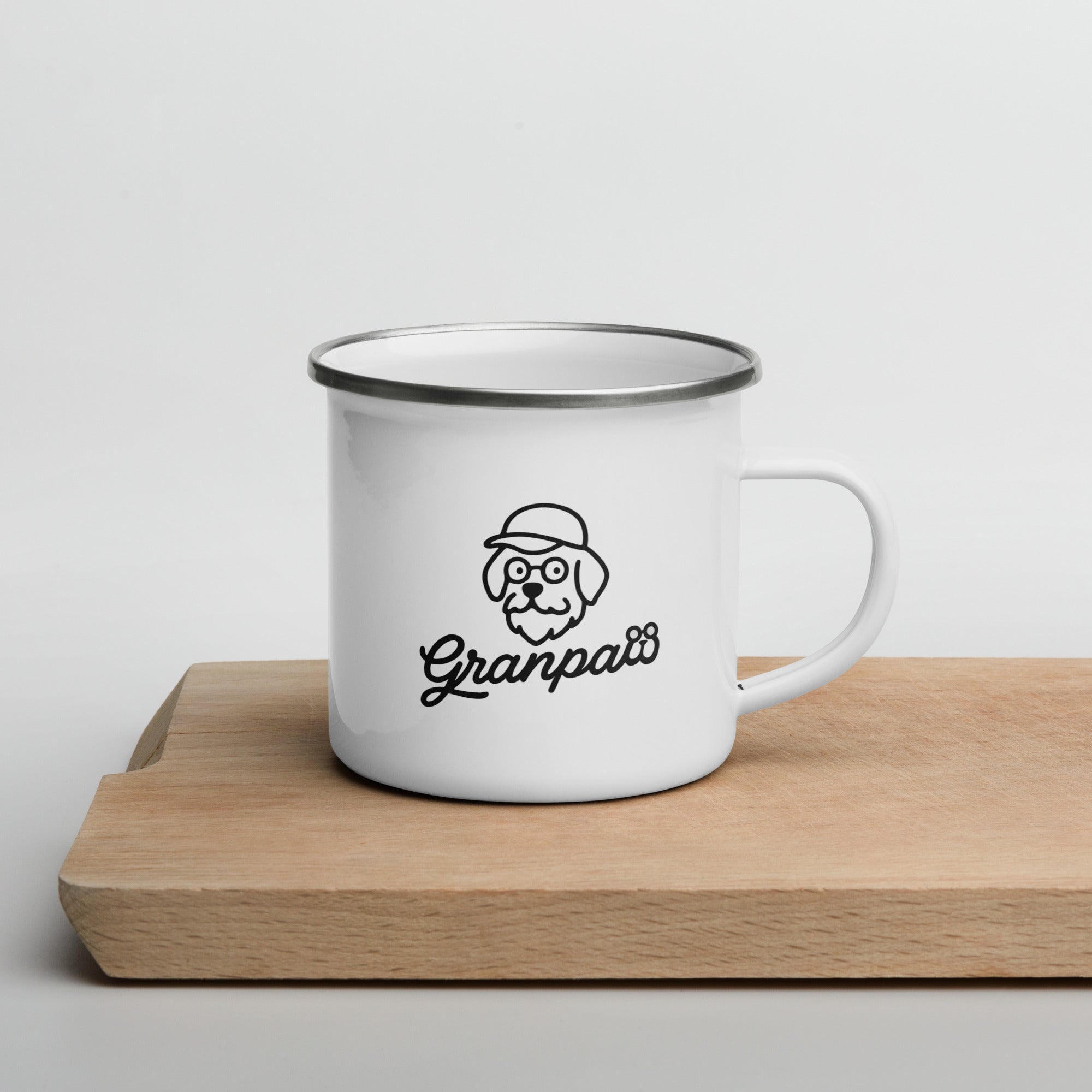White mug with 'Granpaw' design on a wooden surface