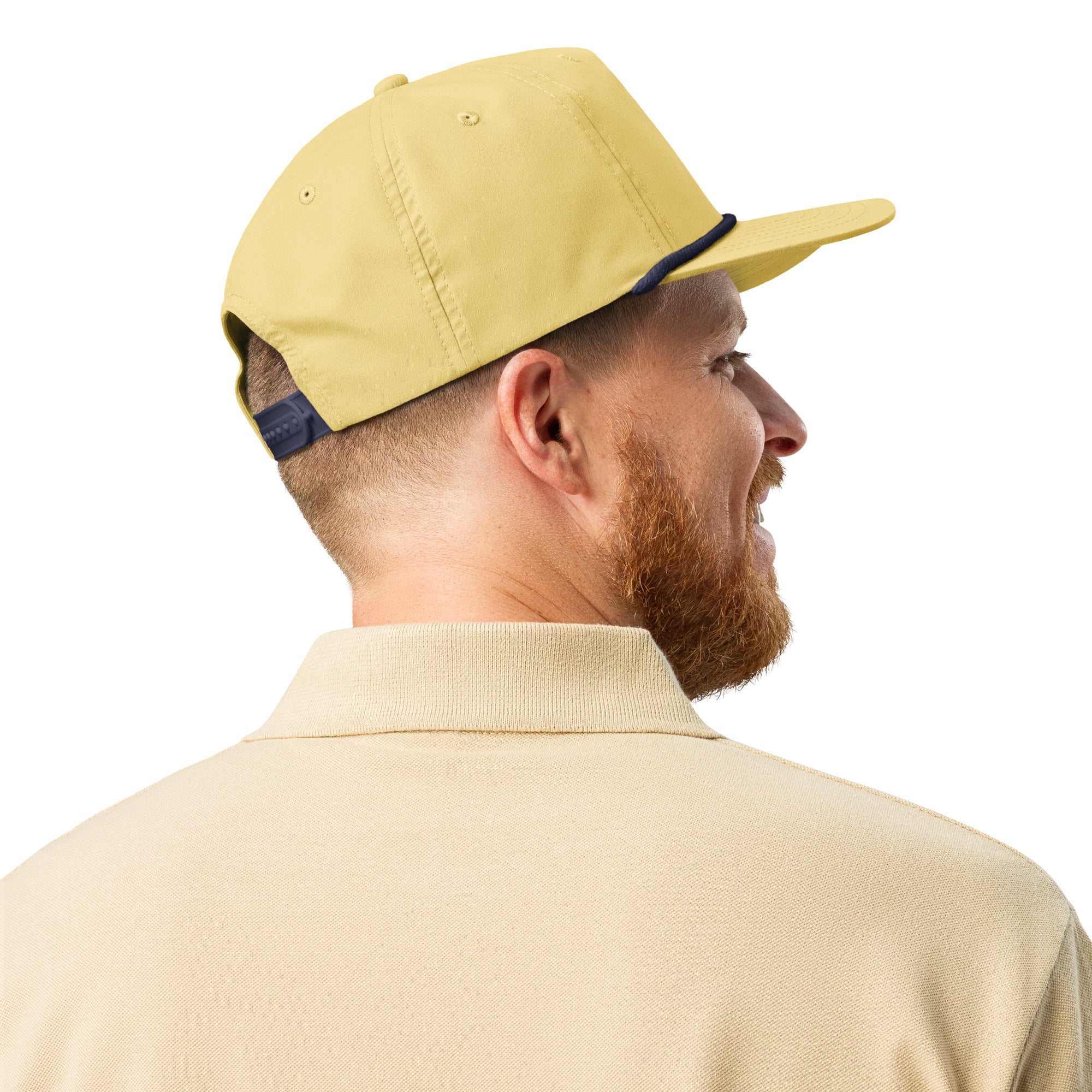 Man wearing a beige cap and shirt on a white background