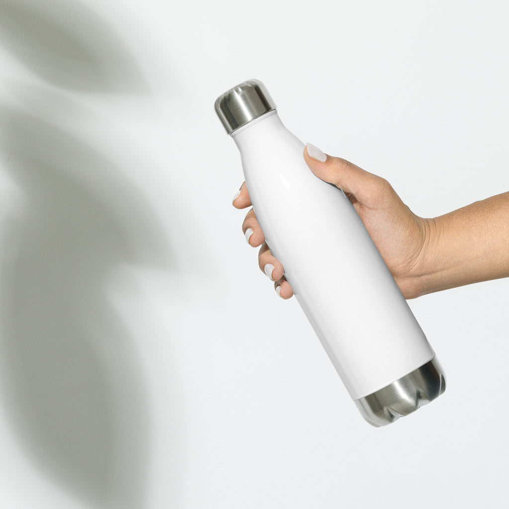 White insulated bottle held by a hand on a light gray background