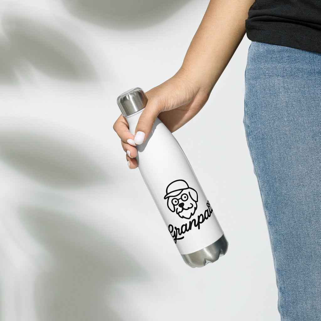 Person holding a white water bottle with a logo on a light gray background