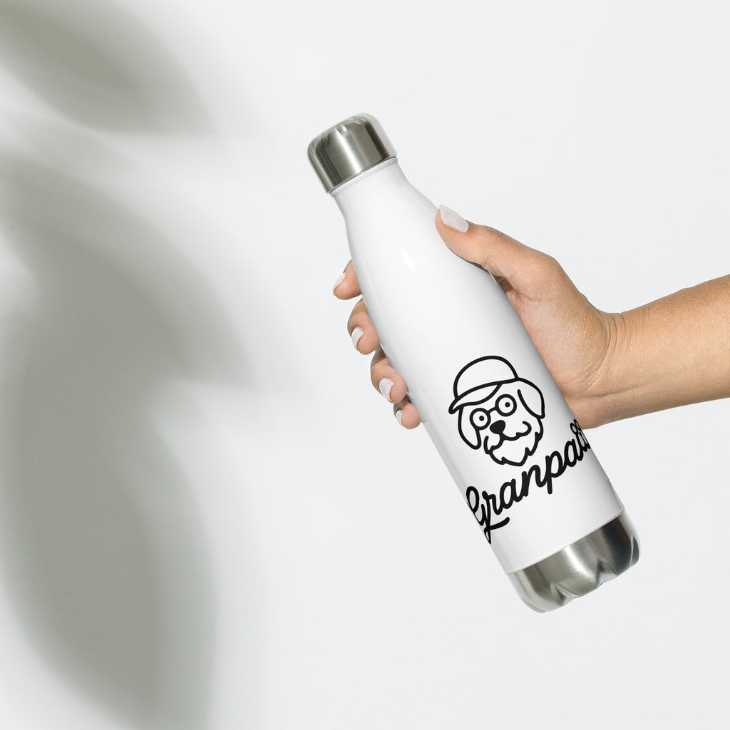 White water bottle with a logo and text held by a hand on a light gray background