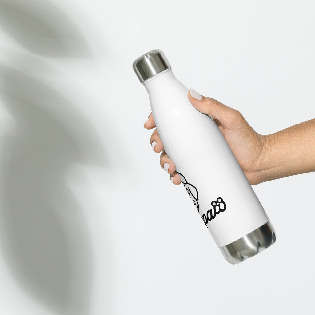 White water bottle with black text held by a hand on a light gray background