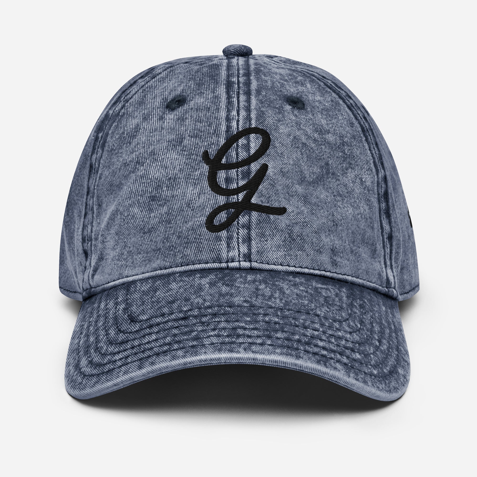 granpaw golf Blue denim cap with a black embroidered logo on a light gray background