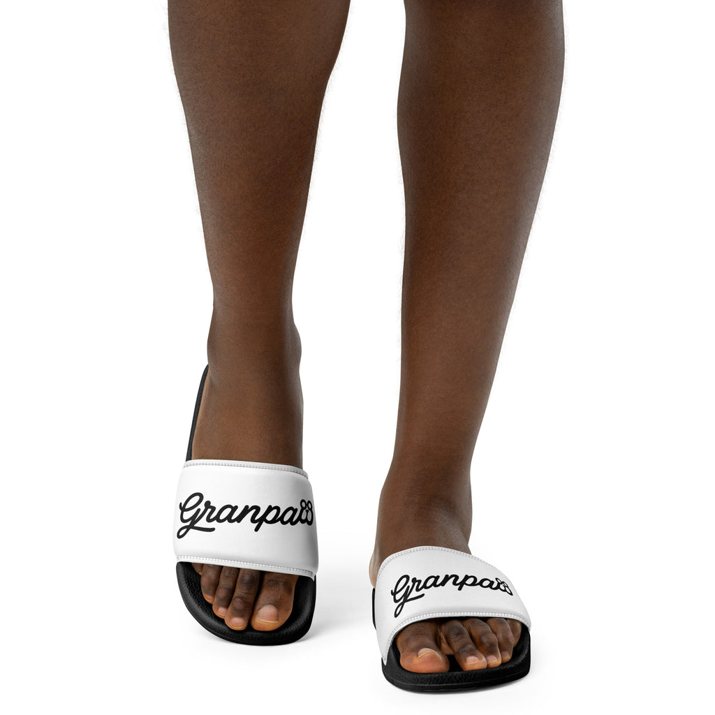 White sandals with 'Granpaw golf' branding on a white background