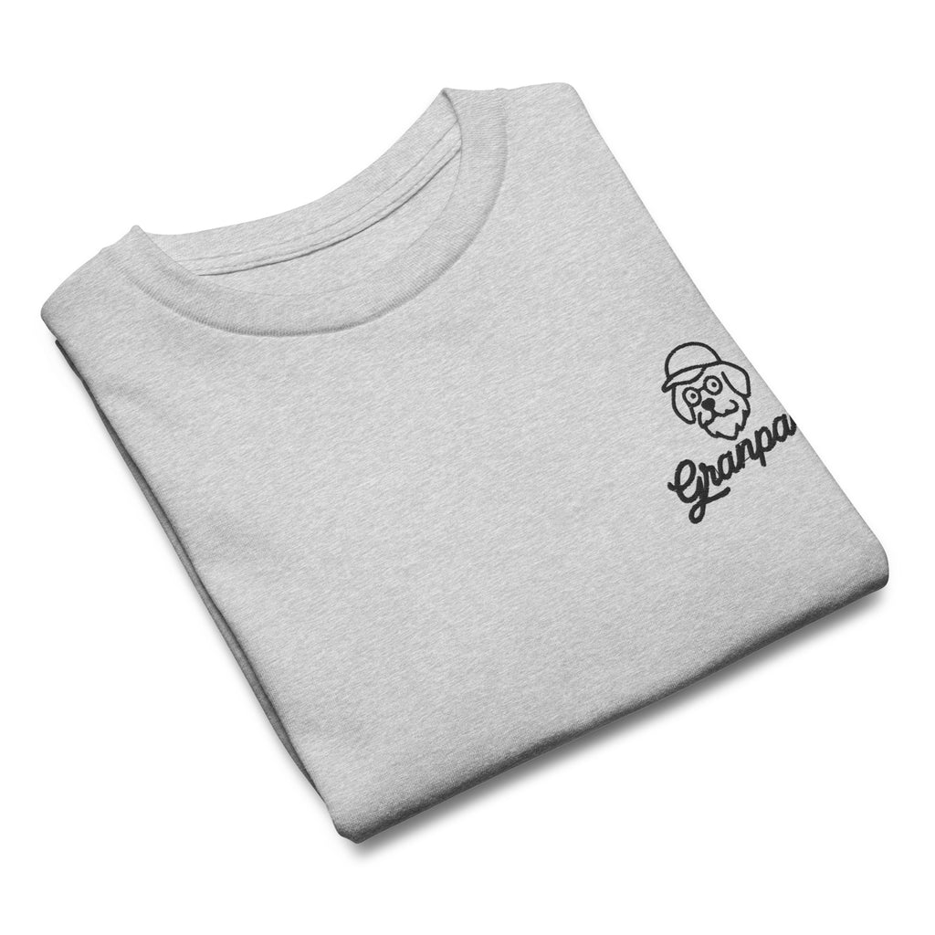 Folded gray t-shirt with a black embroidered design on a white background